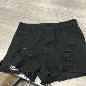 Shein black ripped jean shorts.